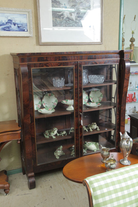 Appraisal: BOOKCASE Flame grain mahogany veneered bookcase with two large glazed