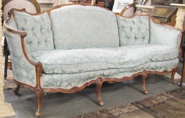 Appraisal: A vintage French period style sofa carved walnut frame with