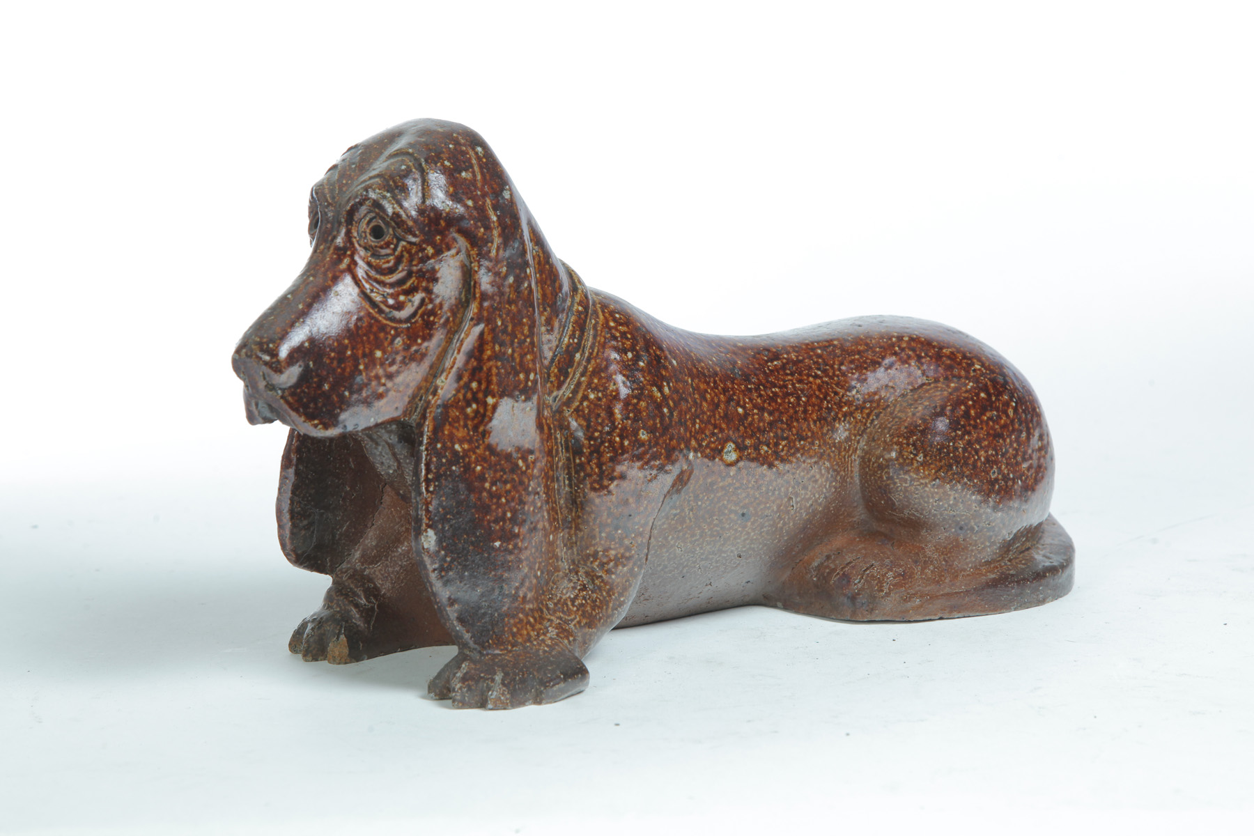 Appraisal: OHIO SEWERTILE BASSET HOUND First half- th century Initialed EJE