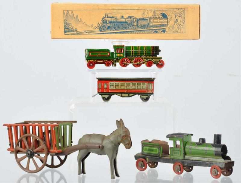 Appraisal: Lot of Tin Litho Penny Toys German Includes one donkey