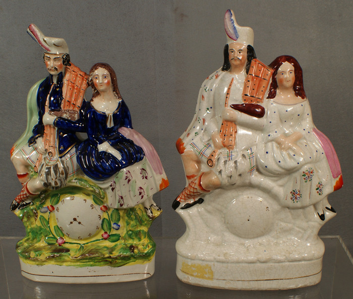 Appraisal: Staffordshire figurines Highlander with Woman clock dial worn on one