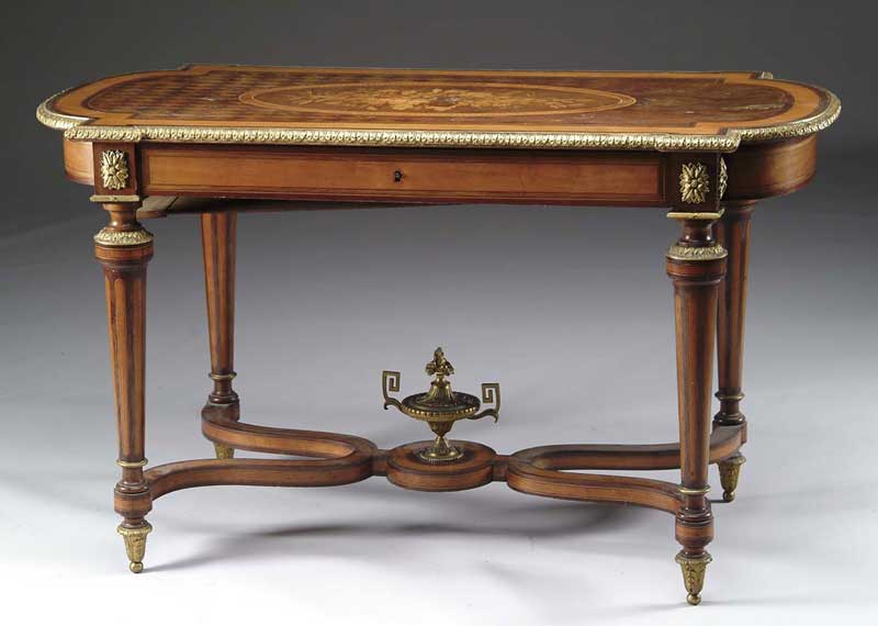 Appraisal: FINE MARQUETRY AND BRASS CONTINENTAL CENTER TABLE The shaped top