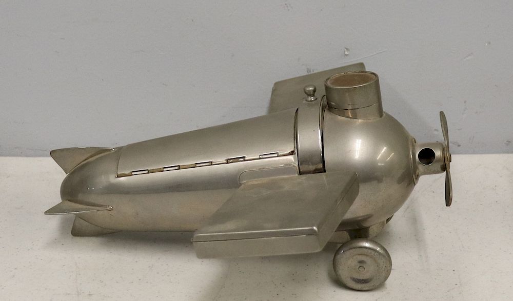 Appraisal: Deco Nickel Plated Aeroplane Smokers Companion J A Henckels Design