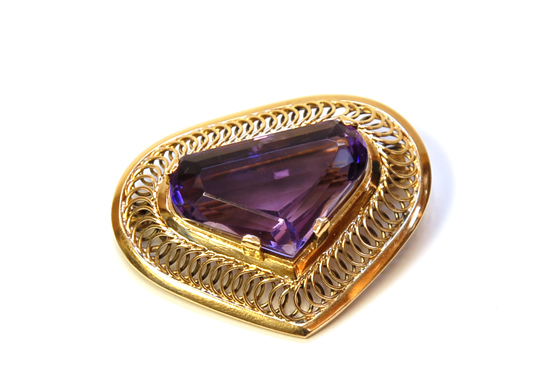 Appraisal: A Gold and Amethyst Brooch a custom made piece of