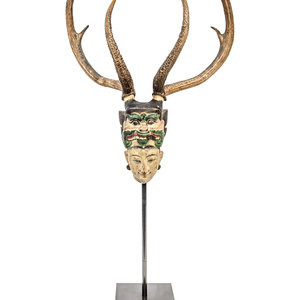 Appraisal: A Burmese Nat Bust With Antlers Late th th Century