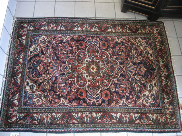 Appraisal: Persian Handmade Rug semi-antique elaborate floral deep blue field '