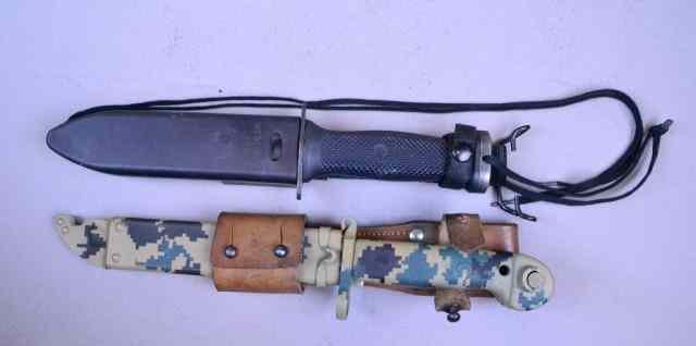 Appraisal: COMBAT KNIVESTo include one bayonet in digital camouflage and one