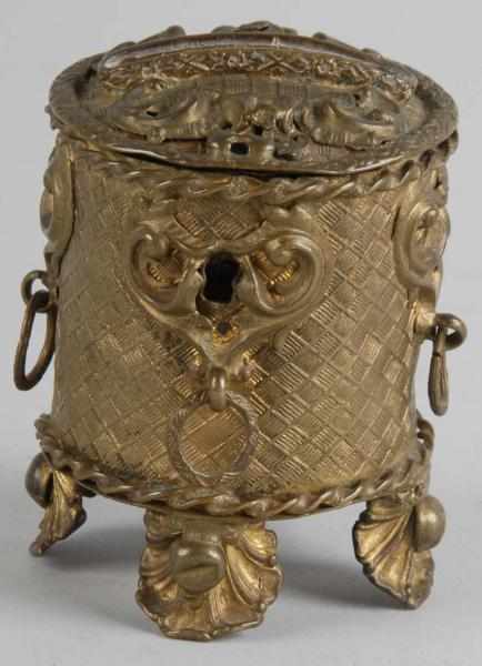 Appraisal: Cast Iron Cylindrical Box Still Bank Description Gold filigree and