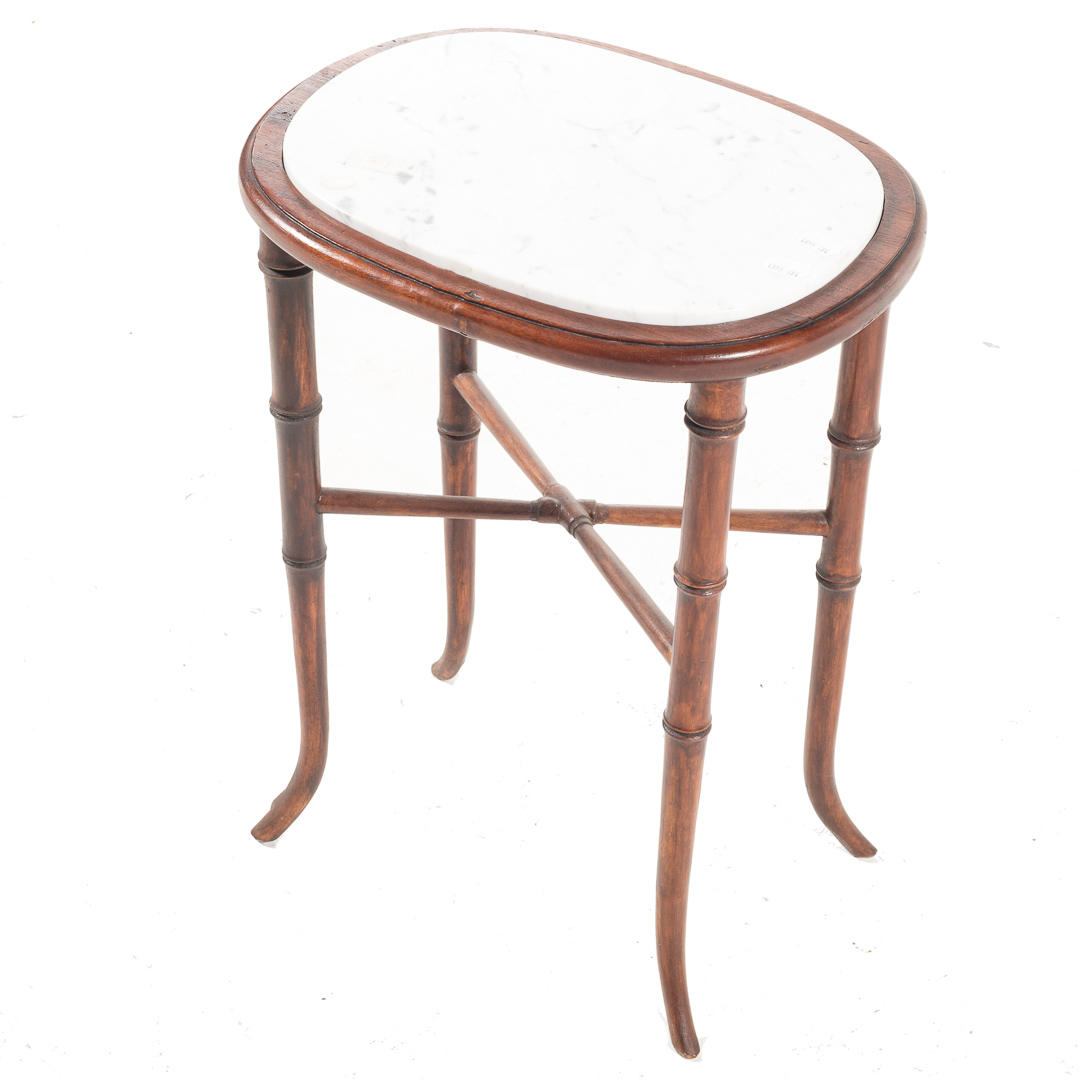 Appraisal: Regency mahogany marble top stand th century bamboo style legs