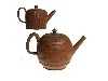 Appraisal: TWO STAFFORDSHIRE REDWARE TEAPOTS AND TWO COVERS the larger globular