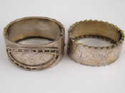 Appraisal: A Victorian silver bangle Birmingham approx cm wide together with