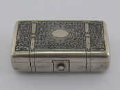 Appraisal: A Russian silver cheroot case finely trompe l'oeil engraved and