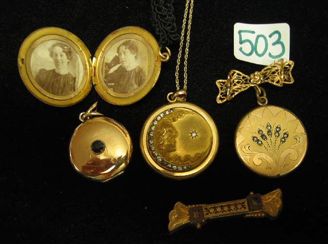 Appraisal: FOUR GOLD LOCKETS AND A GOLD PIN two K yellow