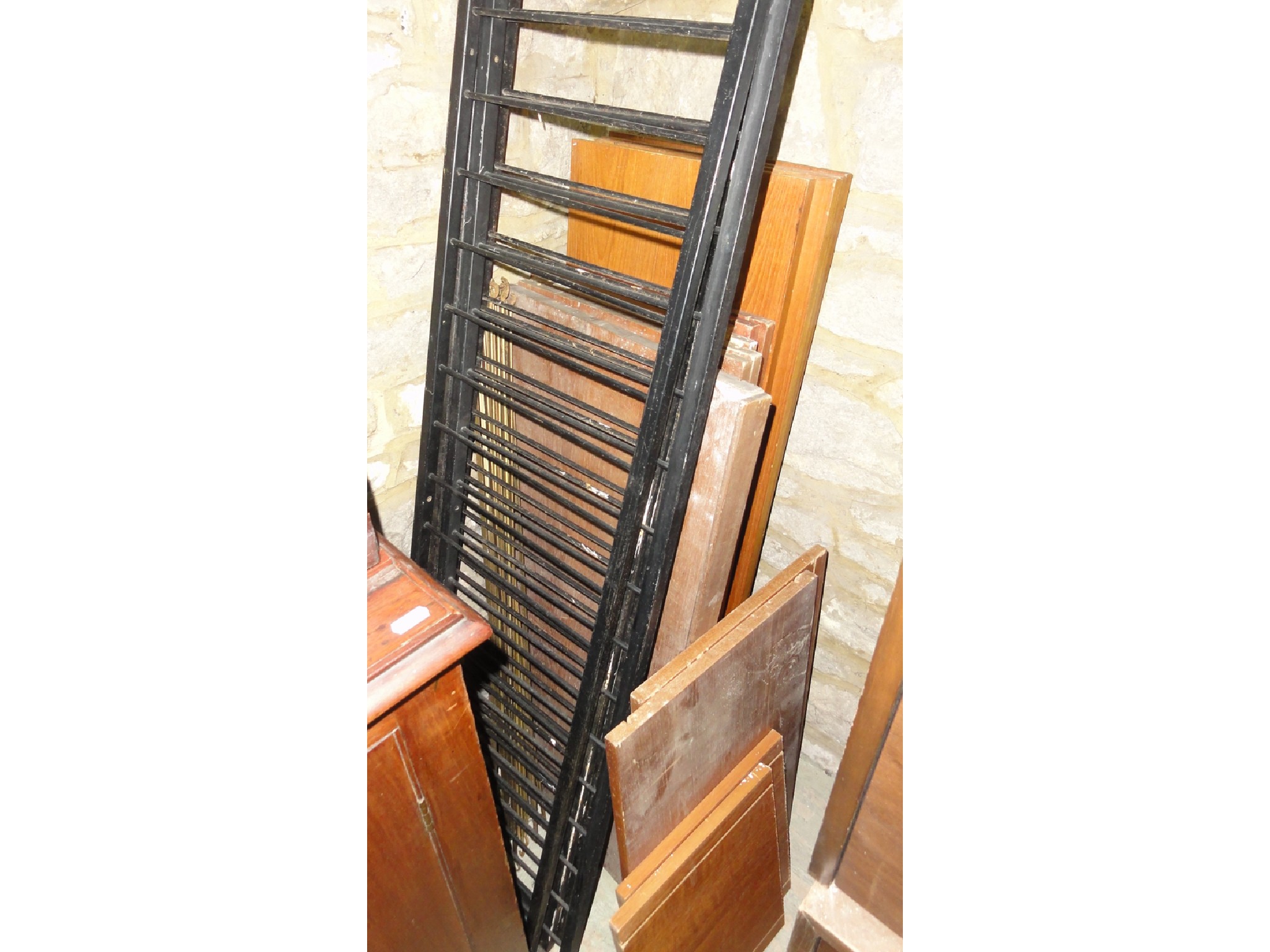 Appraisal: A Ladderax wall unit system comprising three metal uprights and