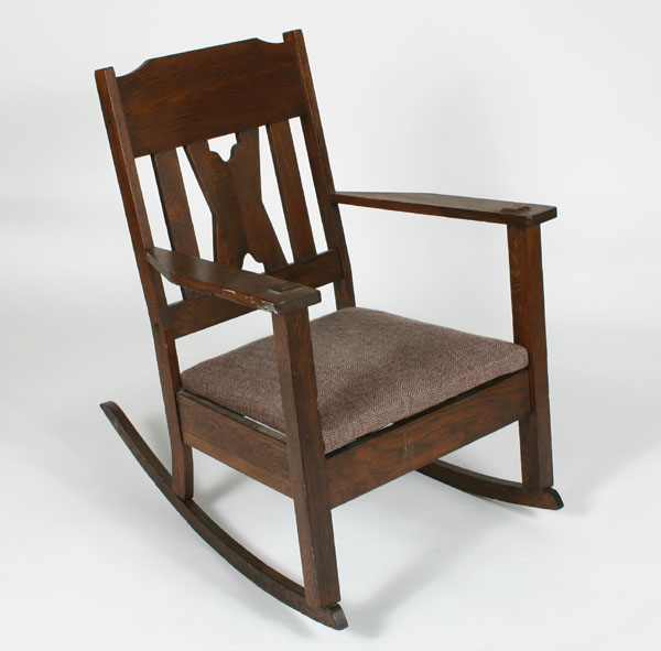 Appraisal: Mission oak rocker with double slat and cut out back