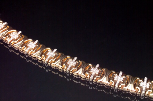 Appraisal: DIAMOND Modular link bracelet in k yellow and white gold