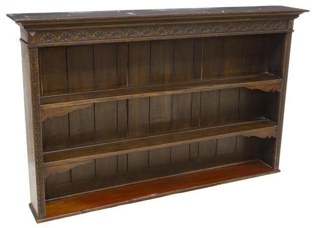 Appraisal: Continental carved oak hanging wall display shelf having rectangular top