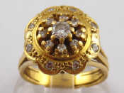 Appraisal: A yellow metal tests carat gold diamond cluster ring approx