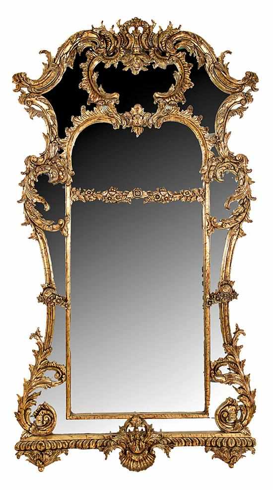 Appraisal: French style carved giltwood pier mirror carved floral pediment above