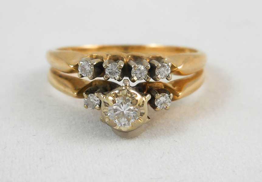 Appraisal: DIAMOND AND FOURTEEN KARAT GOLD RING featuring around-cut diamond weighing