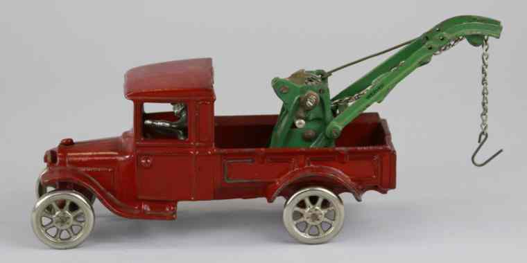 Appraisal: ARCADE MODEL ''T'' FORD WRECKER Cast iron painted in red