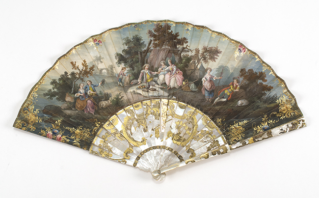 Appraisal: PAINTED VELLUM AND MOTHER-OF-PEARL FOLDING FAN French th CenturyThe leaf