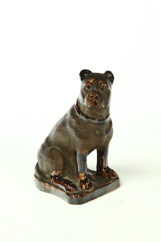 Appraisal: POTTERY DOG Probably Ohio nd half- th century Molded seated