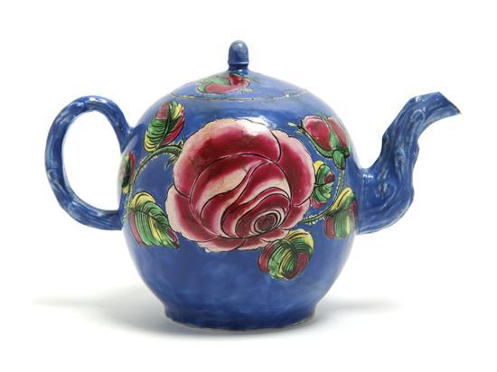 Appraisal: An English Ceramic Teapot th century of spherical form with