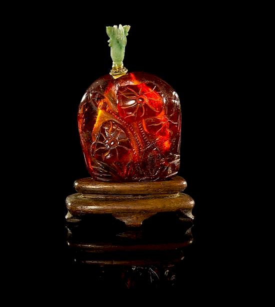 Appraisal: An Amber Snuff Bottle Height inches An Amber Snuff Bottle