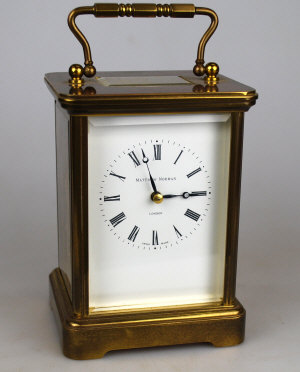 Appraisal: A large brass carriage clock by Matthew Norman of London