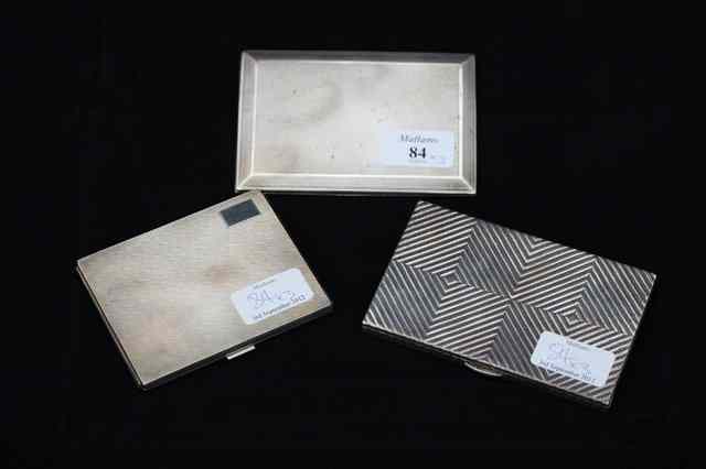 Appraisal: THREE SILVER CIGARETTE CASES approx grams overall