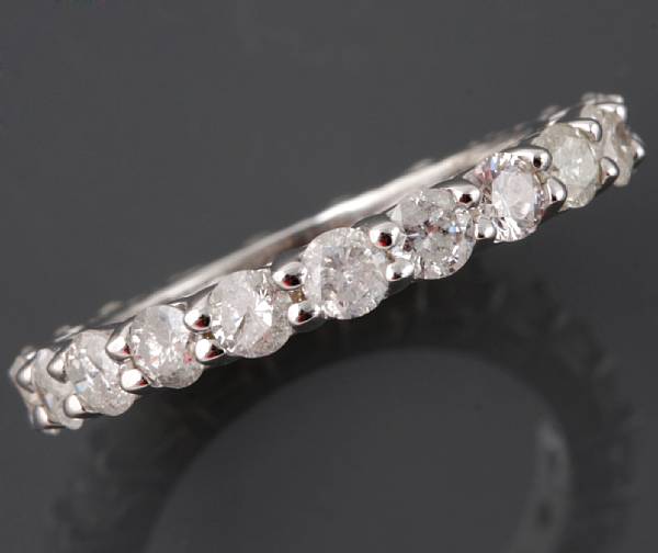 Appraisal: A diamond and k white gold eternity band estimated total