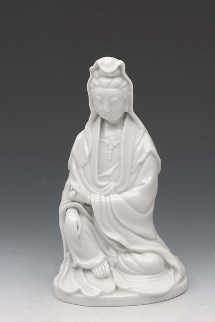 Appraisal: A CHINESE FUKIEN BLANC DE CHINE PORCELAIN MODEL OF GUANYIN