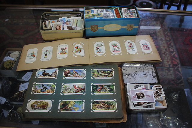 Appraisal: THREE TINS AND VARIOUS ALBUMS OF CIGARETTE CARDS