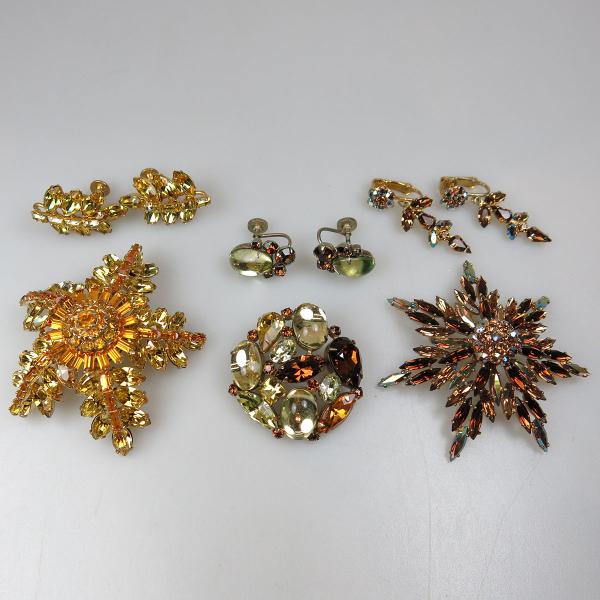 Appraisal: One Triad And Sherman Gold Tone Metal Brooches with screw-back