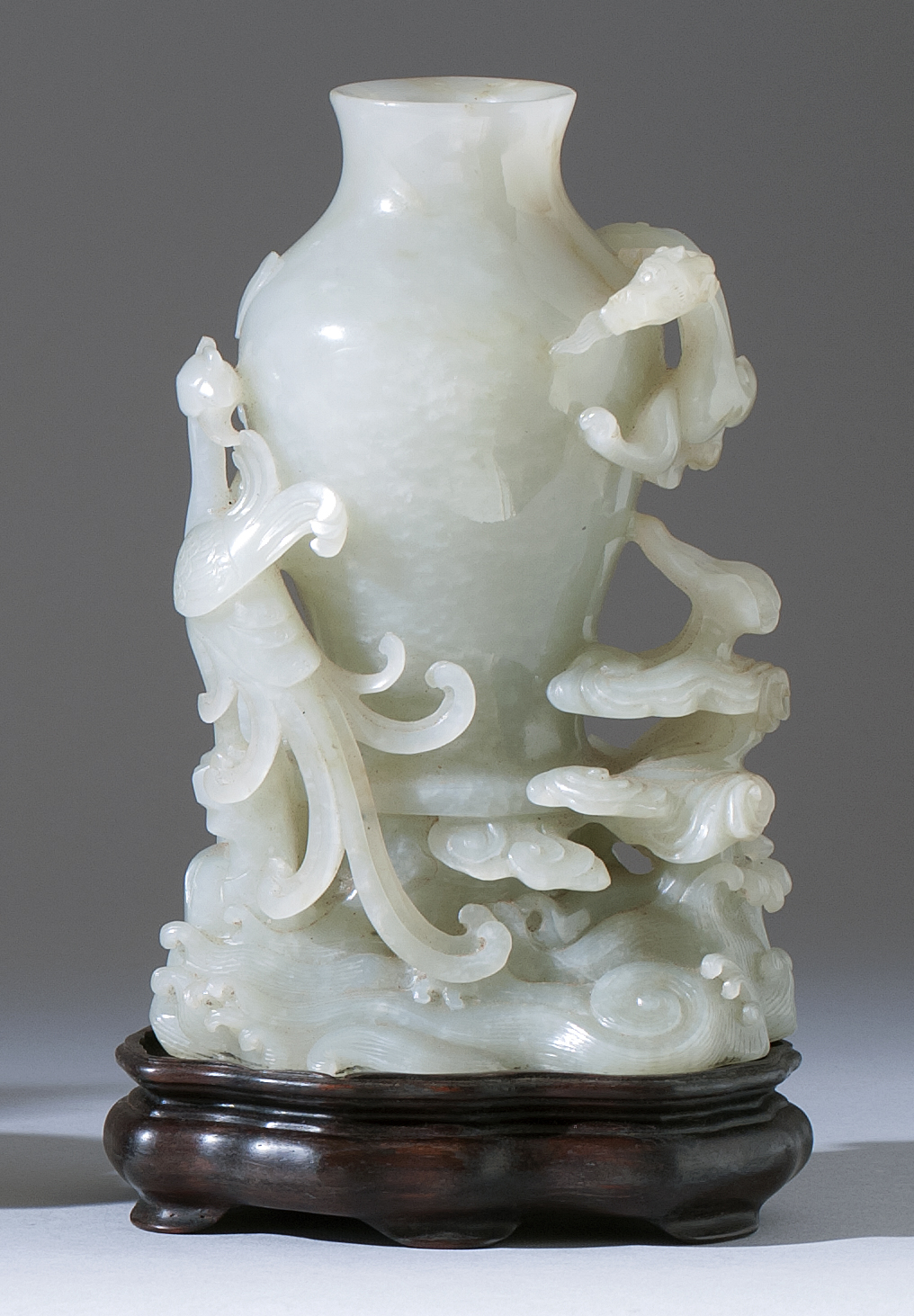 Appraisal: WHITE JADE VASE Late th CenturyIn baluster form with relief