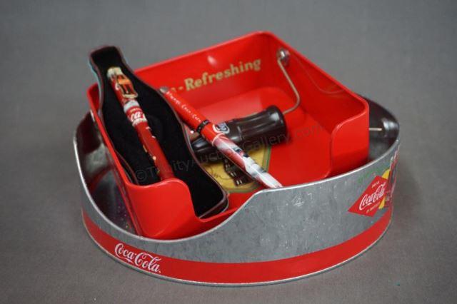 Appraisal: Coke Napkin Serving Trays and Collector Pens Two metal napkin