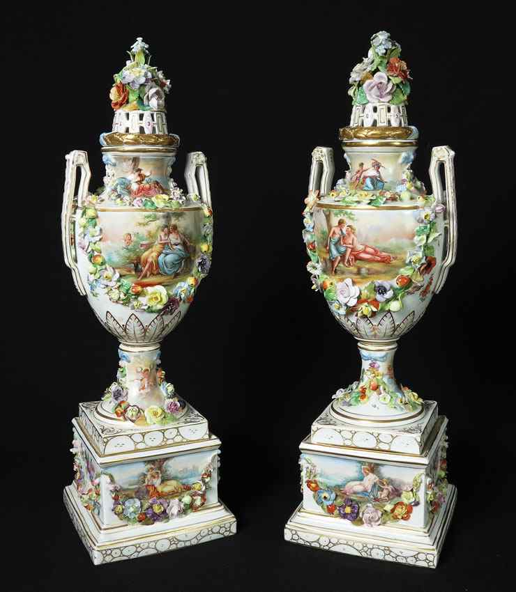 Appraisal: PAIR CARL THEIME GERMAN PORCELAIN COVERED URNS Allegorical images of