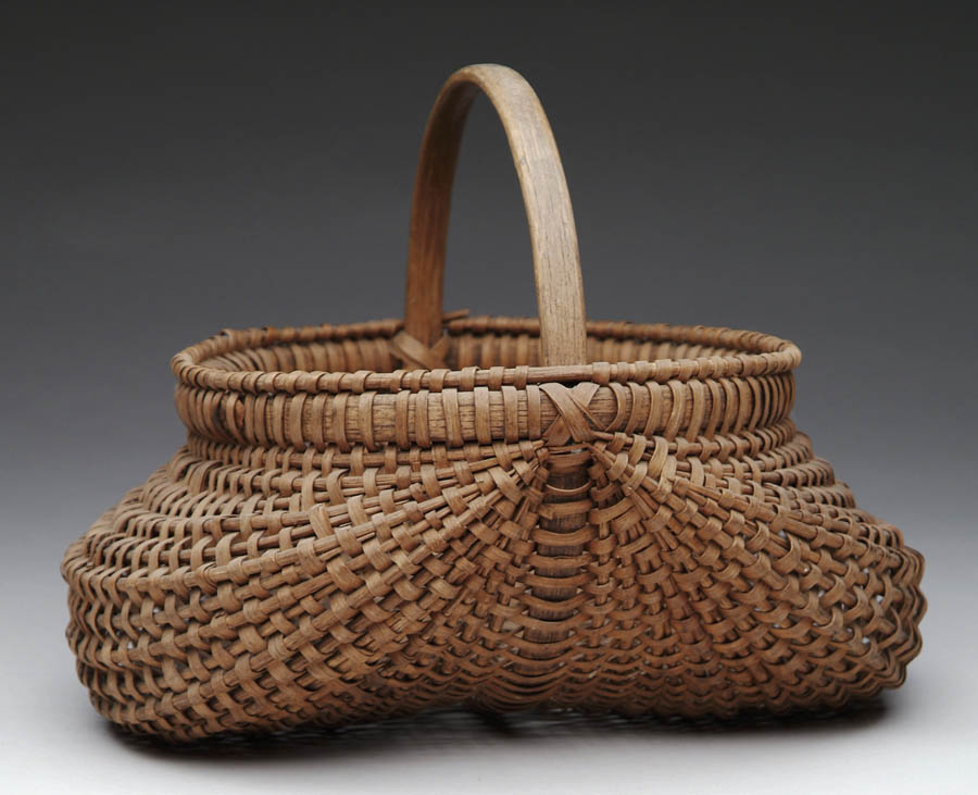 Appraisal: FINE BUTTOCKS BASKET Forty-one rib construction with a fixed half