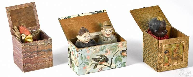 Appraisal: Three painted composition Jack-in-the-box toys Three painted composition Jack-in-the-box toys