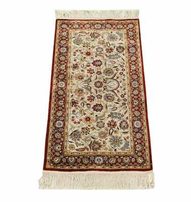 Appraisal: A Fine Silk Carpet Cream ground fringe on both ends