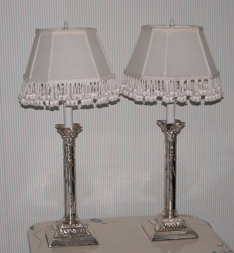 Appraisal: Pair of Sheffield Silver Plated Columnar Lamps with Corinthian Capitols