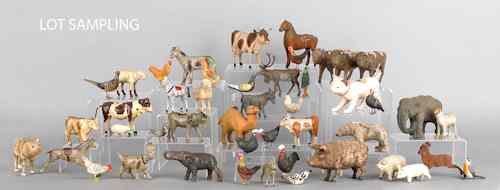 Appraisal: Large group of stick leg and composition animals tallest -