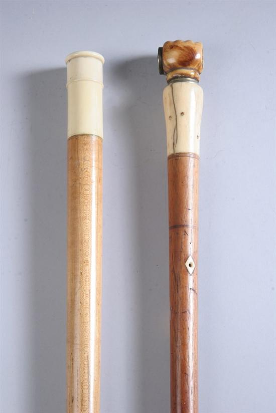 Appraisal: TWO GADGET CANES- PIPE SMOKING SHAVING First carved ivory fist