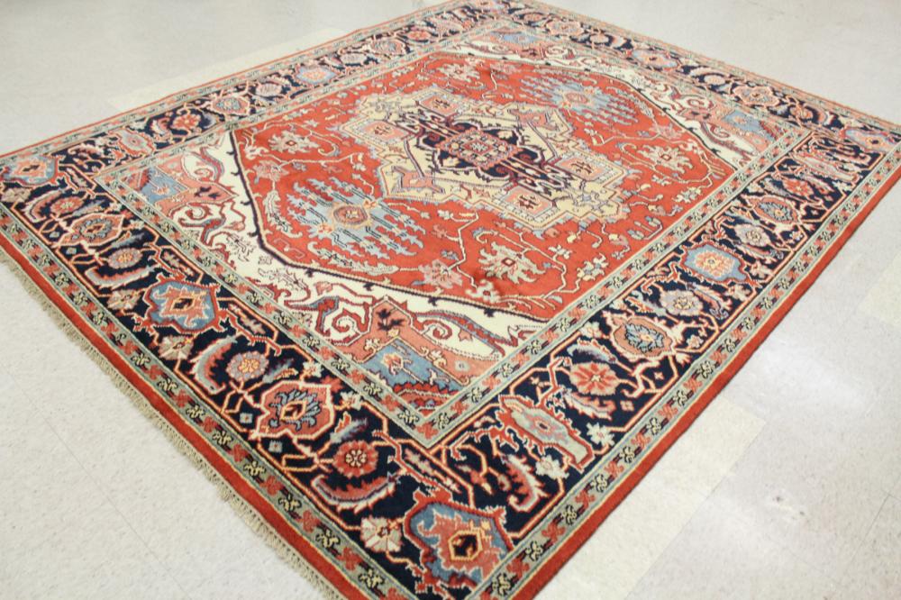 Appraisal: HAND KNOTTED ORIENTAL WOOL CARPET Indo-Serapi stylized floral and central