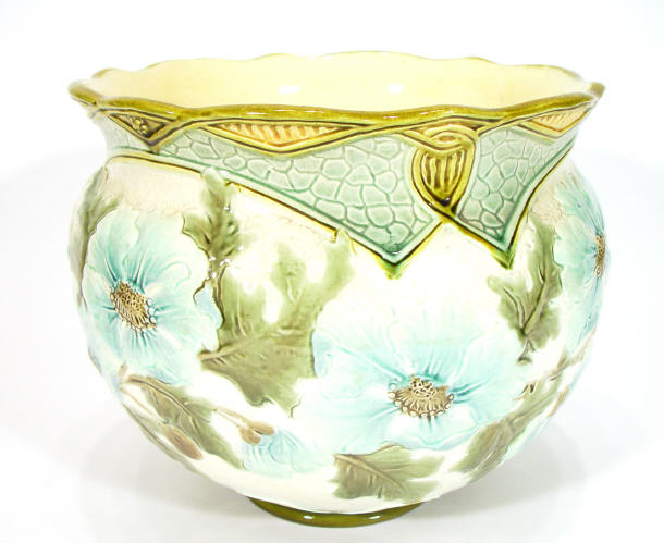 Appraisal: Burmantoft pottery jardiniere hand painted and relief moulded with flowers