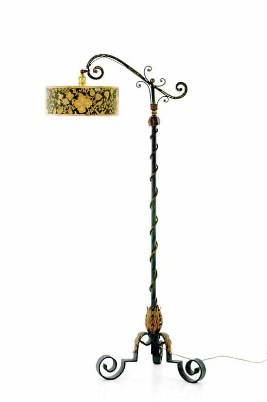 Appraisal: European painted wrought-iron floor lamp scrolling arm holding green shade