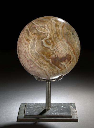 Appraisal: Large and Weighty Polished Quartzite Sphere displaying rose caramel brown