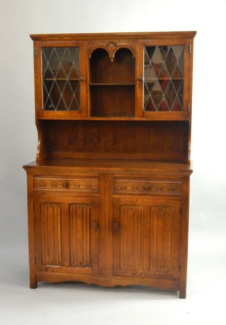 Appraisal: An oak dresser the top with a recess enclosing a