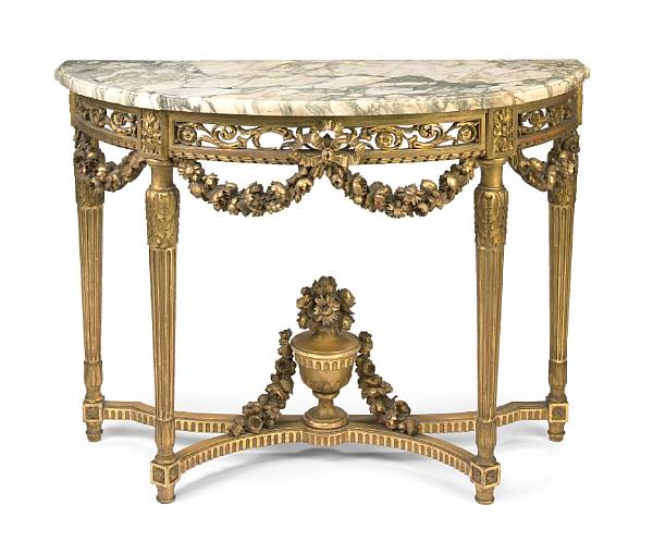 Appraisal: A Louis XVI style carved giltwood and gesso console table